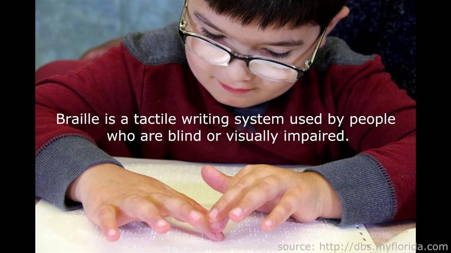 A child reading braille. 